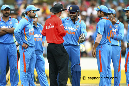 Indian team arguing with umpire