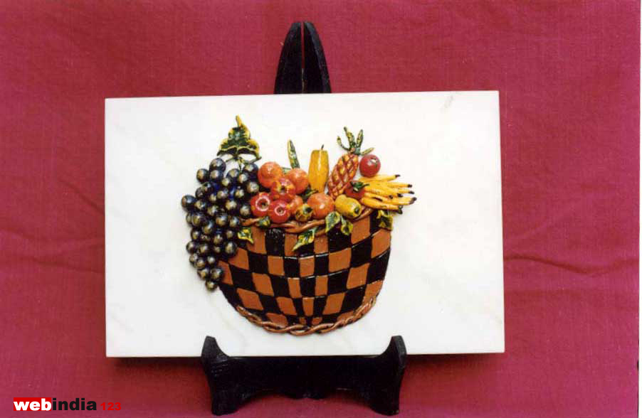 fruit basket on a wooden stand