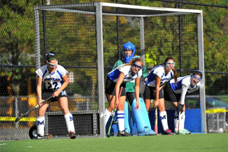 Player  awaits a penalty corner