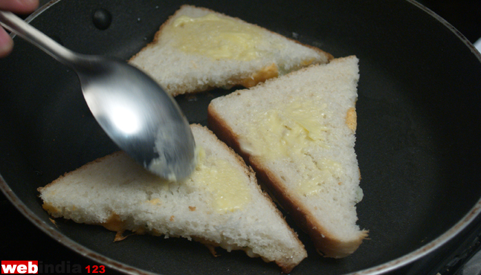 spread butter on top of bread