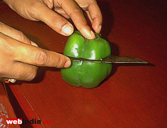 Cut the Capsicum into two pieces