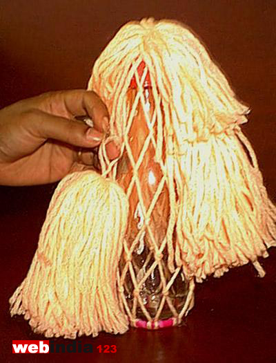 Tying the bundles to the thread cover