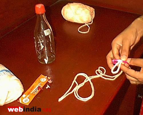 Inserting the two stranded thread in the bangle