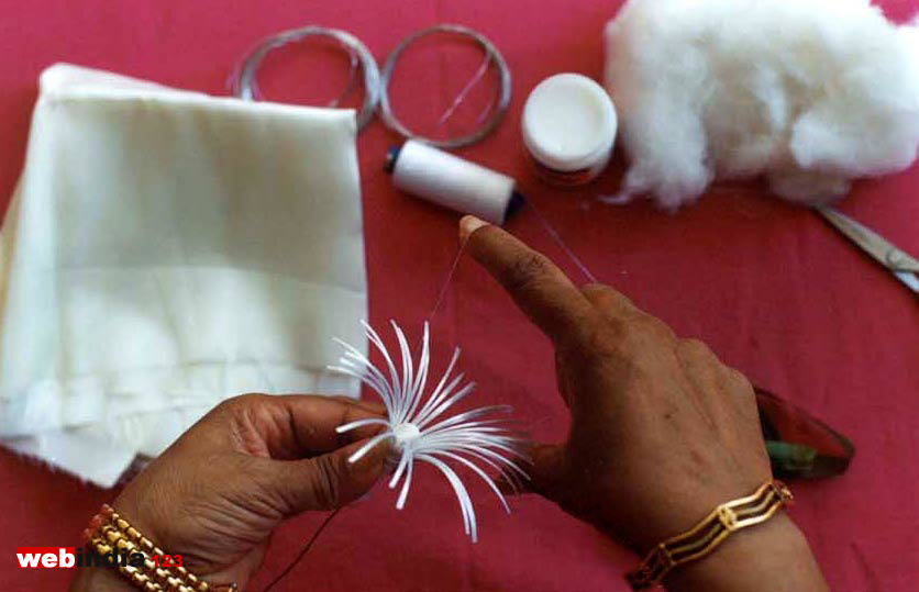 Tying petals around the bud