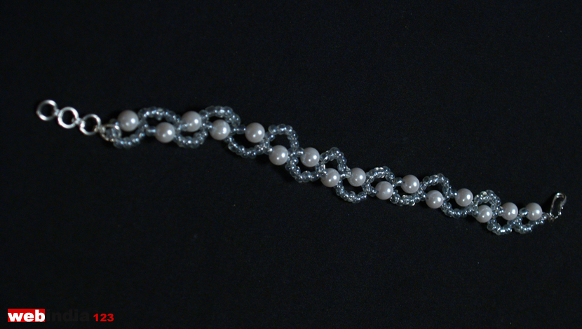 how to make shamballa bracelet using black pearl with elastic｜TikTok Search