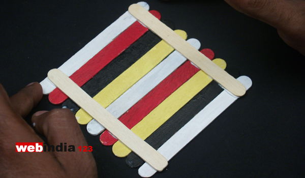 two Popsicle sticks crosswise