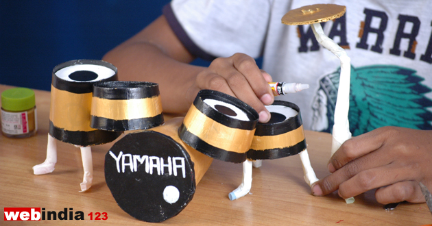 cymbals with straw and cardboard