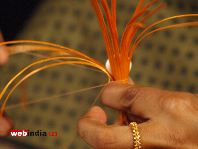 six-inch pieces of the fish wire or the petals to the stem