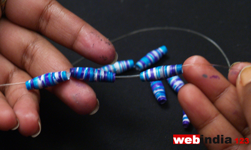 elastic thread, and insert the beads