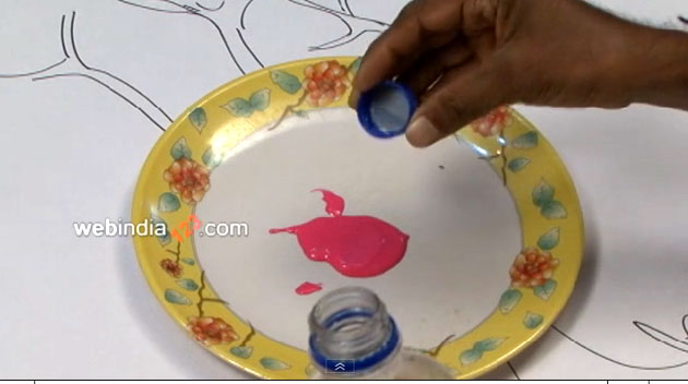 Pouring pink acrylic paint