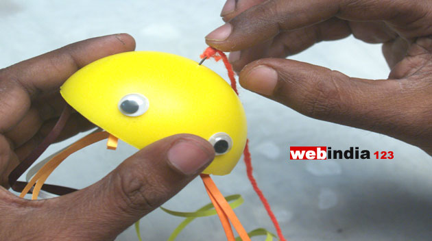 attach a thread to hang the sponge ball