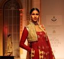 A+model+walks+the+ramp+displaying+an+outfit+by+designers+Ashima+Leena+during+the+Aamby+Valley+India+Bridal+Fashion+Week+%28IBFW%29+2013%2C+in+Mumbai%2C+India+on+December+2%2C+2013%2E
