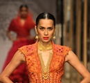 A+model+walks+the+ramp+showcasing+an+outfit+designed+by+Tarun+Tahiliani+during+the+Aamby+Valley+India+Bridal+Fashion+Week+%28IBFW%29+2013%2C+in+Mumbai%2C+India+on+November+29%2C+2013