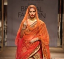A+model+walks+the+ramp+showcasing+an+outfit+designed+by+Tarun+Tahiliani+during+the+Aamby+Valley+India+Bridal+Fashion+Week+%28IBFW%29+2013%2C+in+Mumbai%2C+India+on+November+29%2C+2013