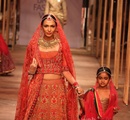 A+model+walks+the+ramp+showcasing+an+outfit+designed+by+Tarun+Tahiliani+during+the+Aamby+Valley+India+Bridal+Fashion+Week+%28IBFW%29+2013%2C+in+Mumbai%2C+India+on+November+29%2C+2013