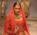 A+model+walks+the+ramp+showcasing+an+outfit+designed+by+Tarun+Tahiliani+during+the+Aamby+Valley+India+Bridal+Fashion+Week+%28IBFW%29+2013%2C+in+Mumbai%2C+India+on+November+29%2C+2013