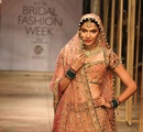 A+model+walks+the+ramp+showcasing+an+outfit+designed+by+Tarun+Tahiliani+during+the+Aamby+Valley+India+Bridal+Fashion+Week+%28IBFW%29+2013%2C+in+Mumbai%2C+India+on+November+29%2C+2013