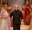 Fashion+designer+Tarun+Tejpal+walks+the+ramp+as+he+showcases+his+outfits+during+the+Aamby+Valley+India+Bridal+Fashion+Week+%28IBFW%29+2013%2C+in+Mumbai%2C+India+on+November+29%2C+2013%2E