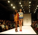 A+model+displays+the+creation+by+fashion+designers+from+Inter+National+Institute+of+Fashion+Designing+%28iNIFD%29+during+the+Lakme+Fashion+Week+%28LFW%29+Summer%2F+Resort+2014+in+Mumbai%2C+India+on+March+12%2C+2014%2E
