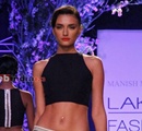 A+model+displays+the+creation+of+fashion+designer+Manish+Malhotra+during+the+Lakme+Fashion+Week+%28LFW%29+Summer%2F+Resort+2014+in+Mumbai%2C+India+on+March+11%2C+2014