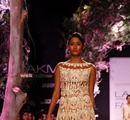 A+model+displays+the+creation+of+fashion+designer+Manish+Malhotra+during+the+Lakme+Fashion+Week+%28LFW%29+Summer%2F+Resort+2014+in+Mumbai%2C+India+on+March+11%2C+2014