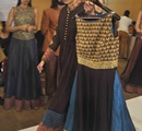 A+model+carries+an+outfit+during+fittings+ahead+of+the+Lakme+Fashion+Week+Winter%2FFestive+2013%2C+in+Mumbai%2C+India+on+August+19%2C+2013%2E+The+five+day%2Dlong+LFW+Winter%2FFestive+2013+begins+on+August+23%2E+