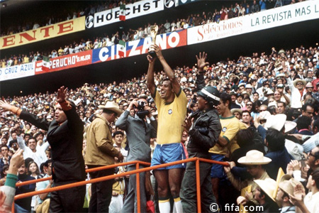 Captain Carlos Alberto Torres holding the Jules Rimet Trophy