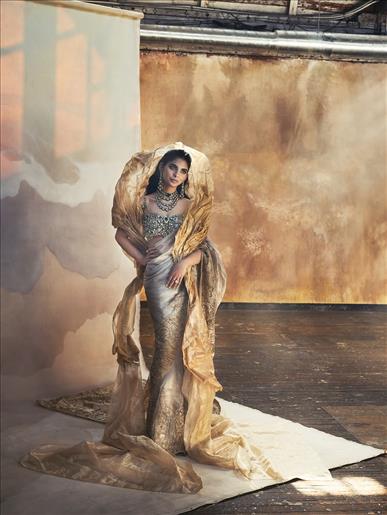 gold dress ambani Isha Ambani Wears Over 1,800 Carats of Jewels to the Met Gala